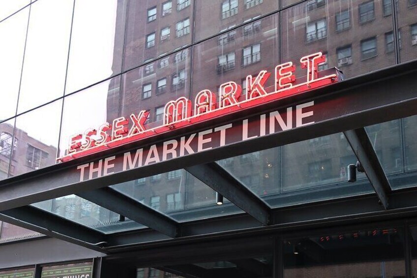 We stop and shop at Essex Market. 