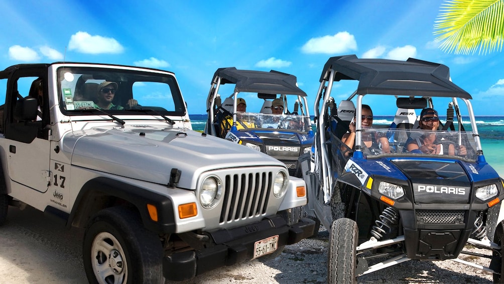 Jeep and dune buggies on the sand in Riviera Maya
