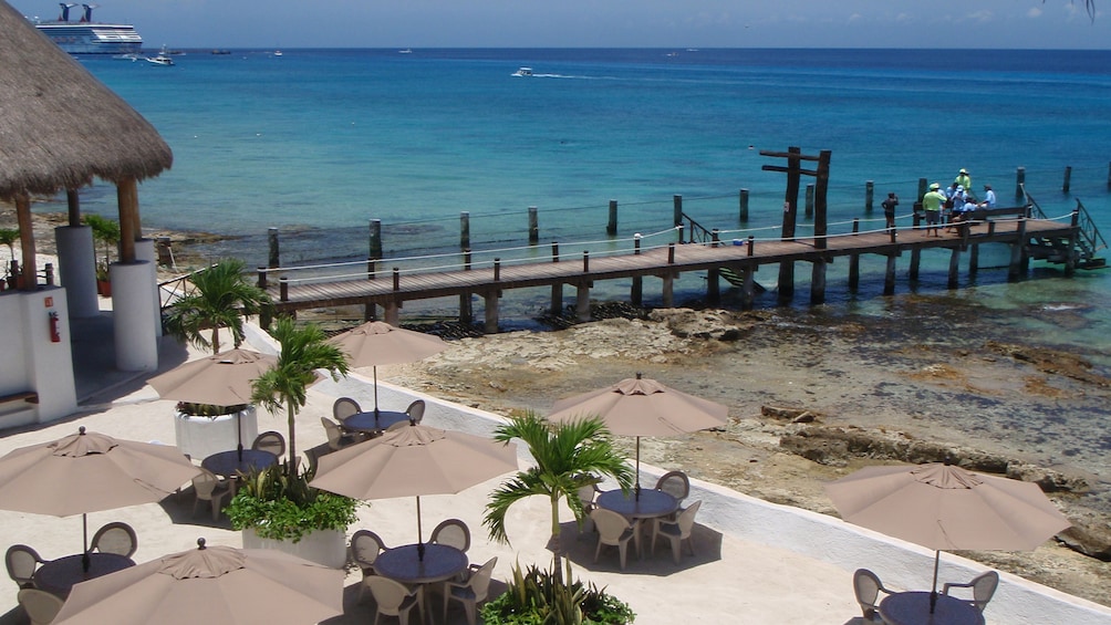 Beachside tables and dock in Cozumel