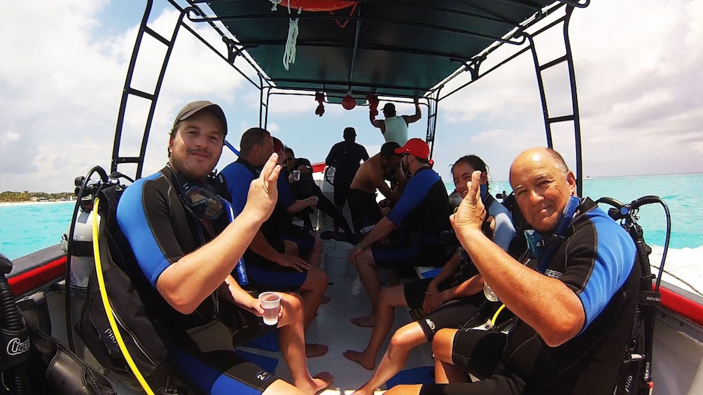 Scuba diving group on a boat in Riviera Maya