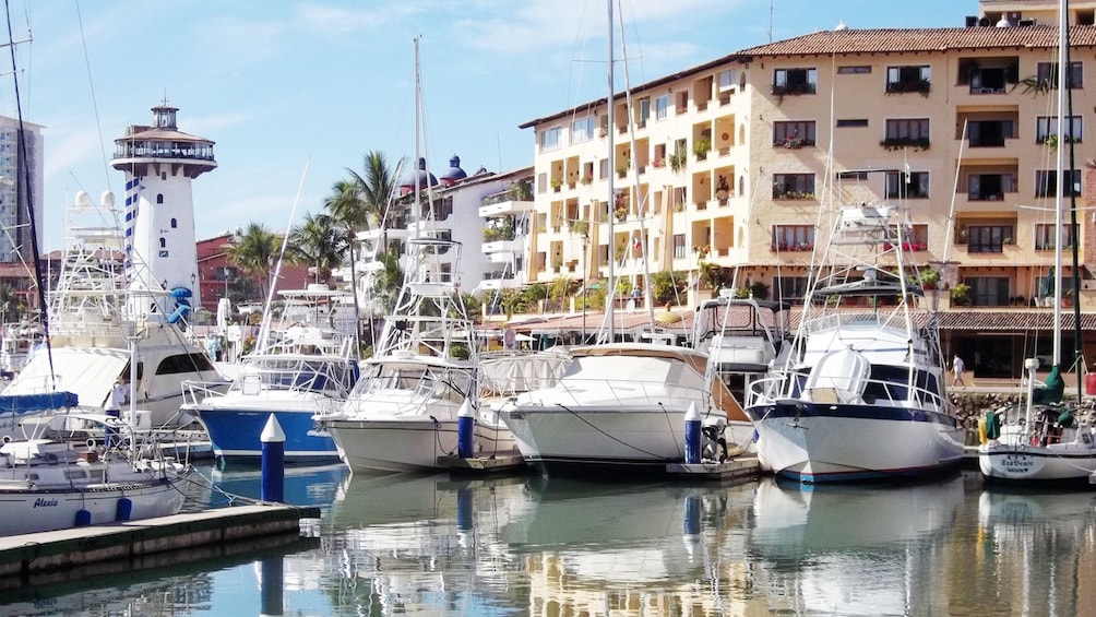Explore Puerto Vallarta's marina to discover local shops and landmarks