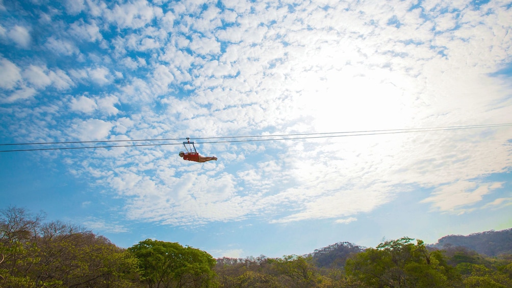 Witness majestic views of the tropical forest in the Sierra Madre Mountains as you ride on Mexico's longest zipline