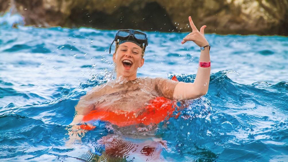 person with goggles swimming in Vallarta 