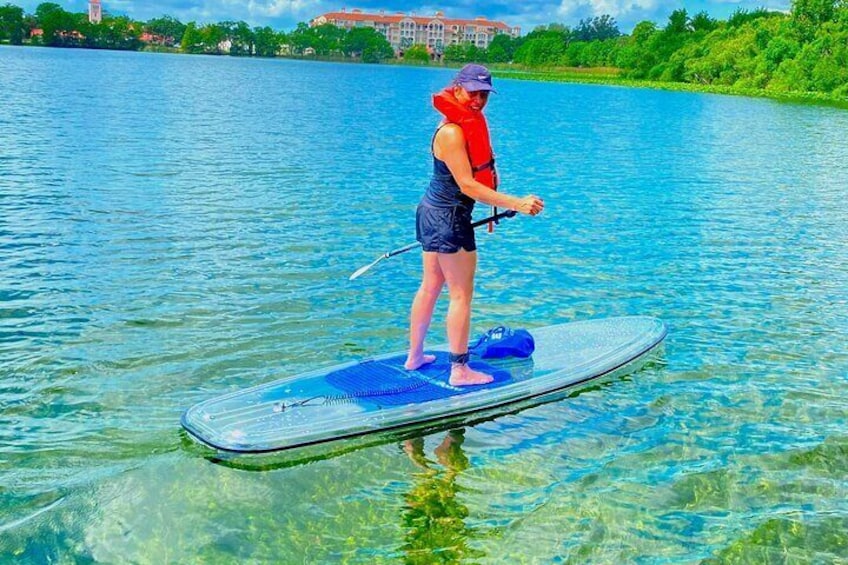 Our clear paddleboards show off the brilliant water below.