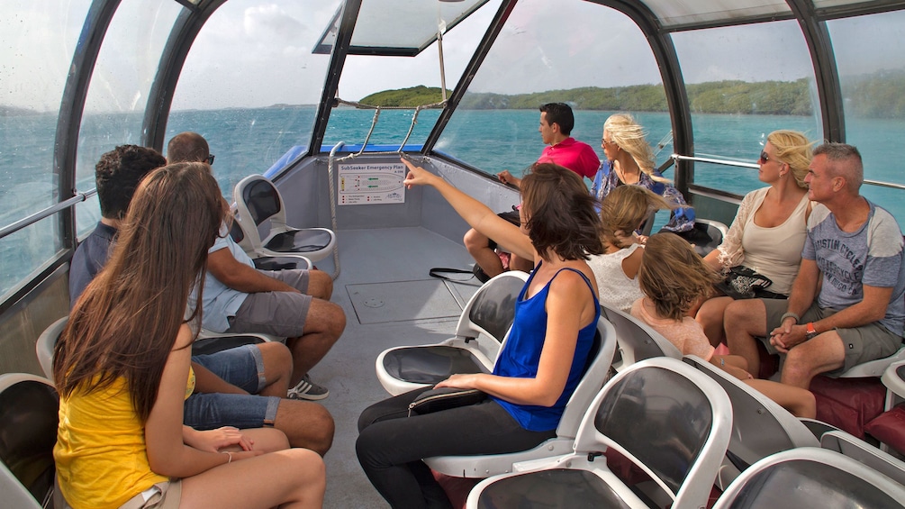 Show item 5 of 10. people on top deck of tour vessel