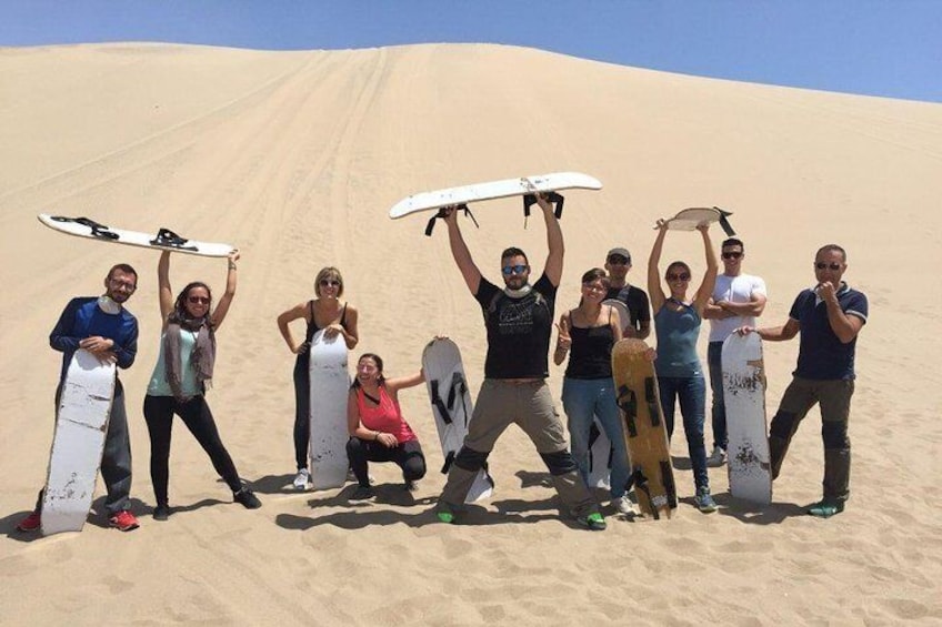 group tour using sandboarding