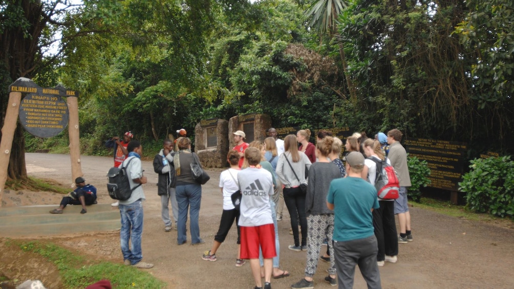 Tour group at the entrance to Mount Kilimanjaro National Park in Tanzania