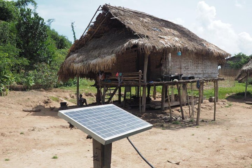 A villager's house and a solar panel. 