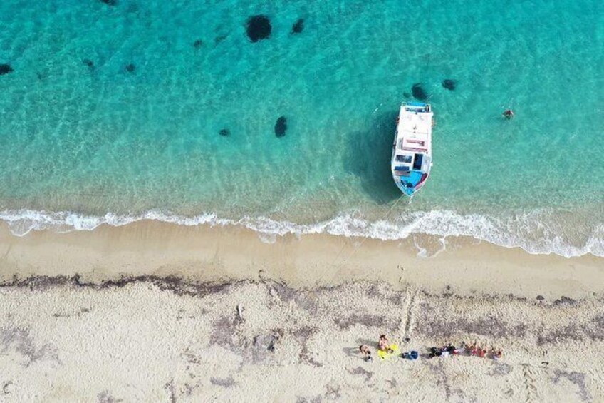 Show item 2 of 10. Cruise to turtle's island and caves with a glass bottom boat