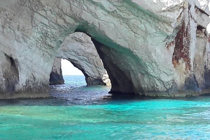 Show item 3 of 12. From St Nikolaos port: Boat cruise to navagio shipwreck beach and blue caves