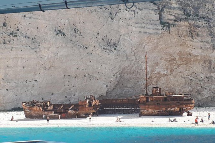 Show item 1 of 12. From St Nikolaos port: Boat cruise to navagio shipwreck beach and blue caves