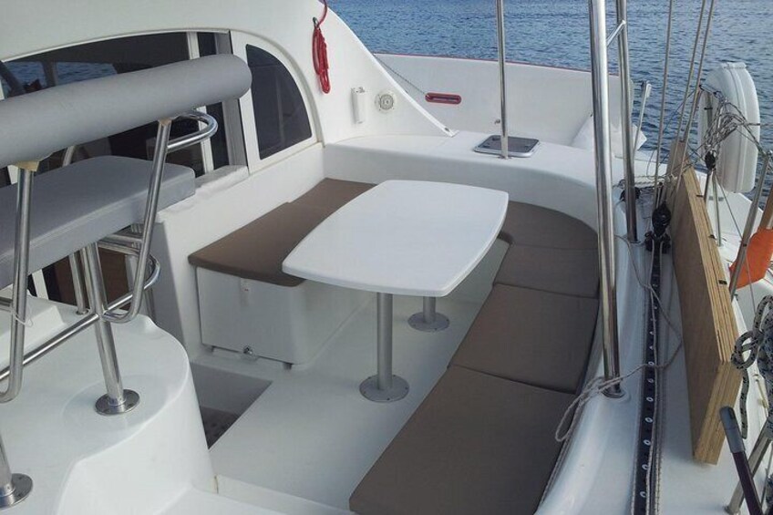 You can chill at the back of the catamaran, with seats for up to 8 passengers.