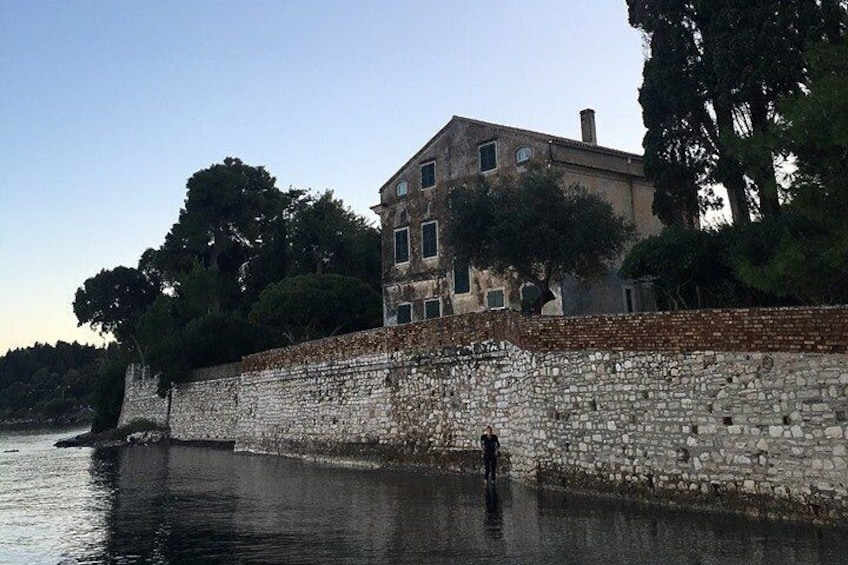 The Pink Bike Tour: Swim in front of the Durrells House