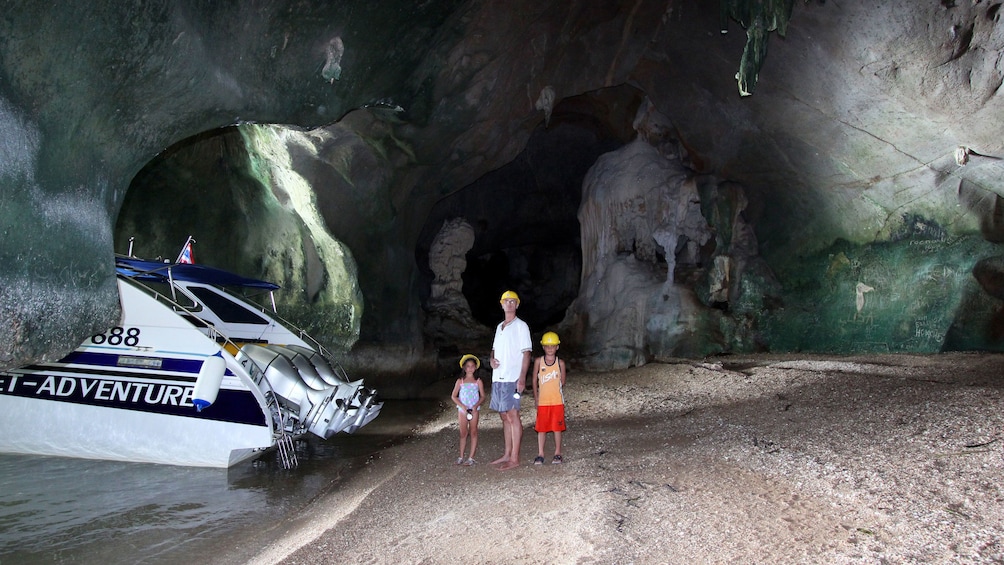 family inside a cave in Phuket