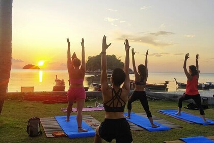 Sunrise yoga class overlooking the beach, the sea & sunrise @ Idyllic resor...