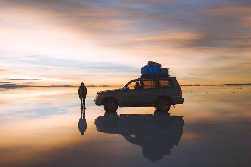 Appreciating the sunrise over Uyuni Salt Flats, Bolivia