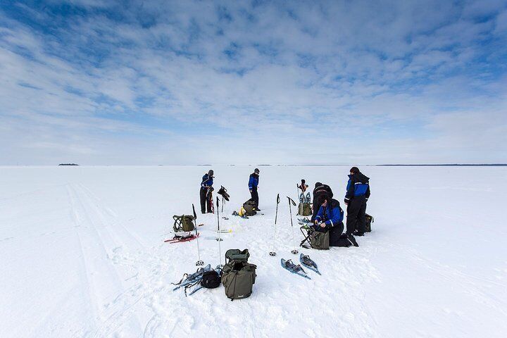 Ice Fishing by Snowmobile from Levi