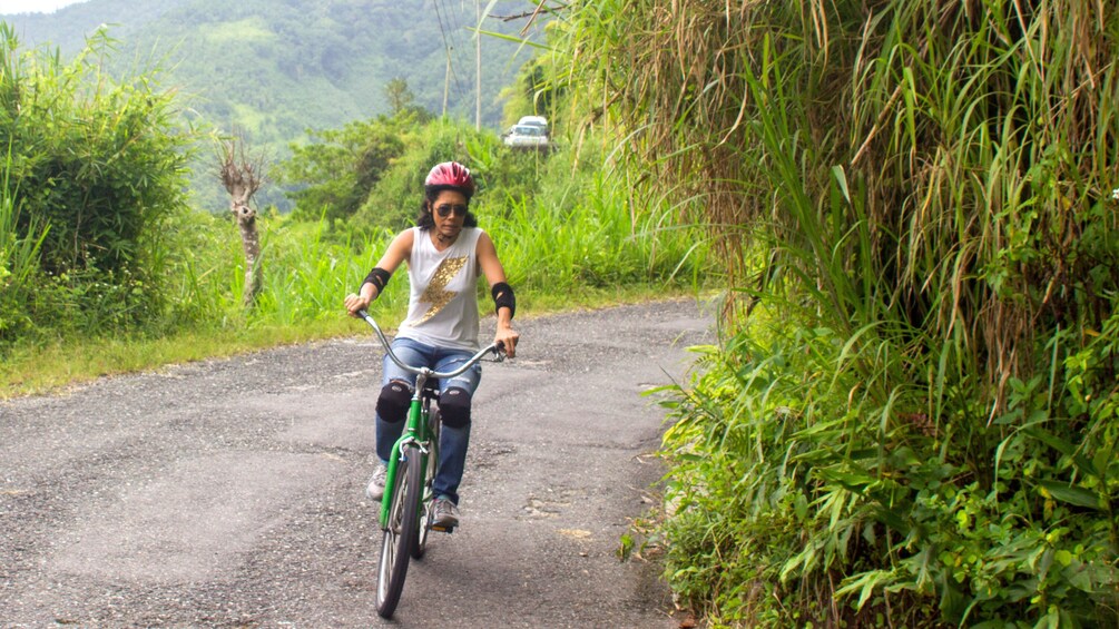 woman riding on a bike in jamaica 