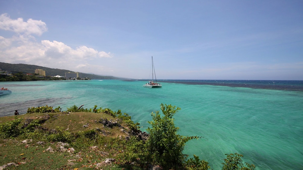 Sail boat seen from land in Jamaica 