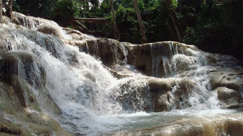 close up of the rocky waterfall in the Dunn river in Jamaica