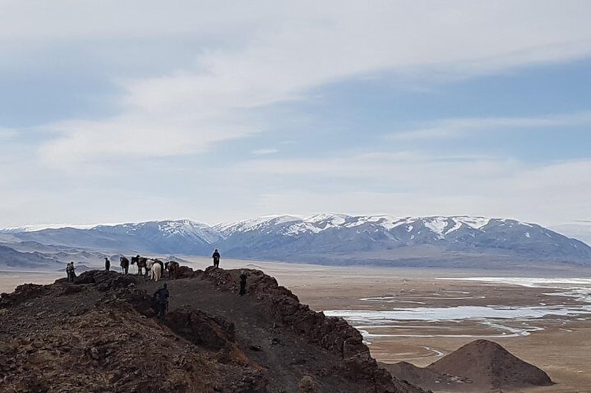 Photographing The Altai mountains, the frozen river before is Khovd river