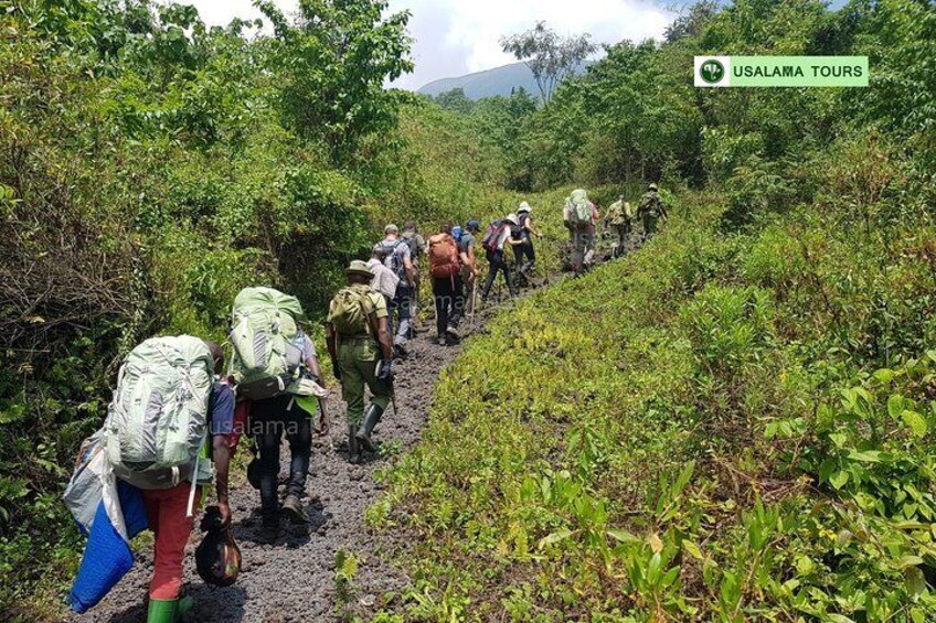 The journey is still on, taking breaks and feeling the sun, rocks here make it hard to go! but know the prize, we are still looking forward and we won't relent until.- NYIRAGONGO VOLCANO