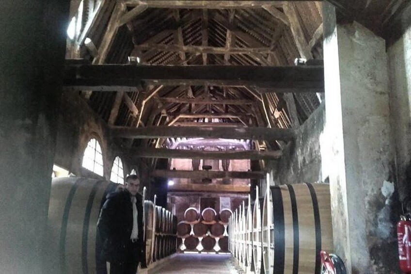 Ageing room with Oak barrels at the Breuil en Auge