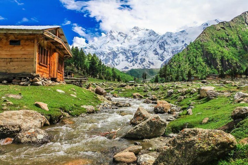 A cabin next to a river in Fairy Meadows.