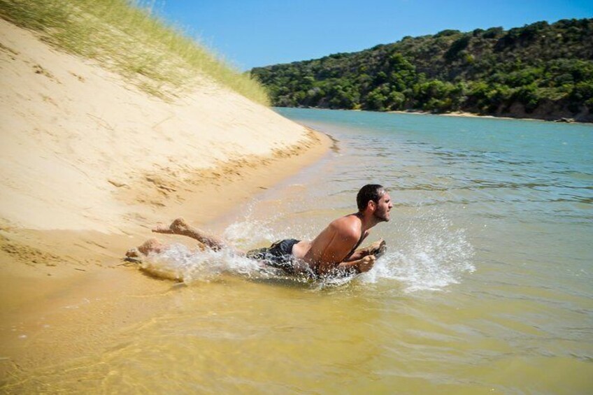 Sandboard on our flat boards and go straight into the River