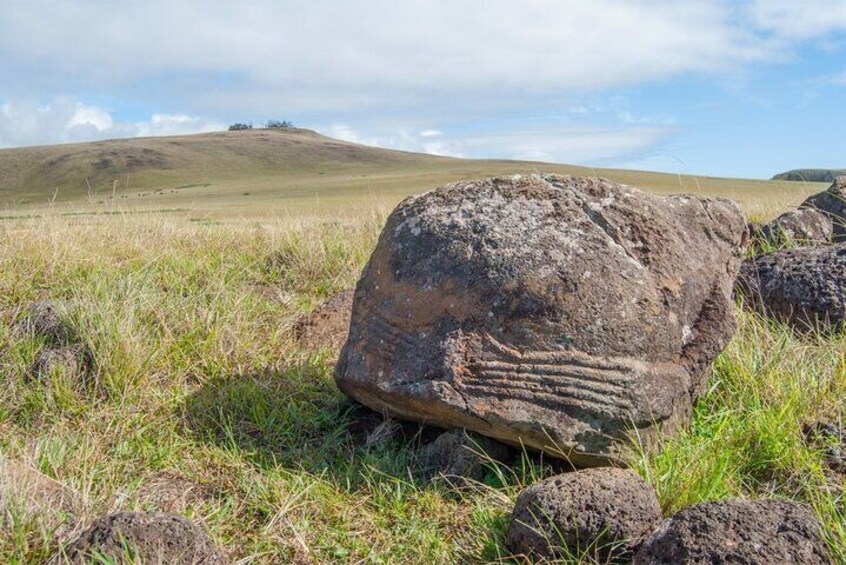 At the far side, we find the only statues of the island ever made of the white trachyte rock