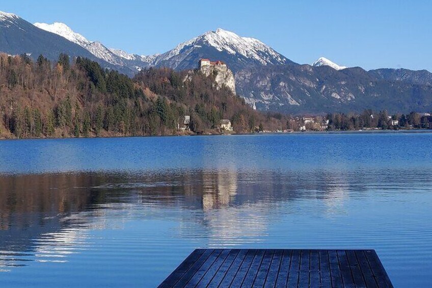 The lakes Bled castle, with surrounding sniw covered Julian alps.