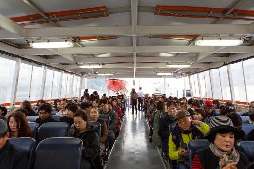 Visitors enjoying the peaceful ride back from Capri to Naples after a day of exploring the island.