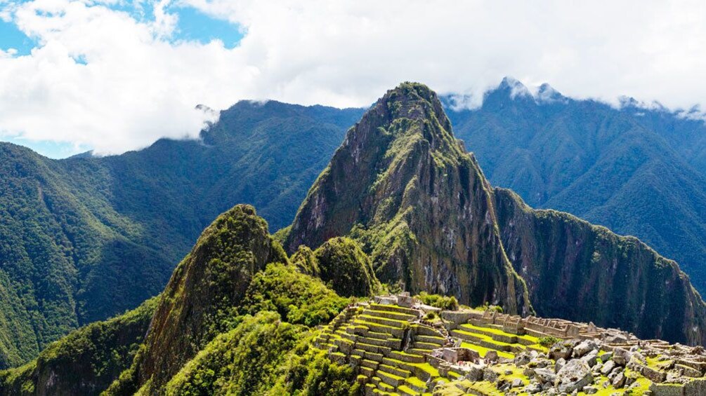 Machu Picchu sitting high in the Andean Mountains