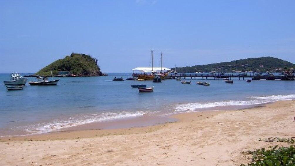 Buzios sandy beach and pier in Rio de Janeiro