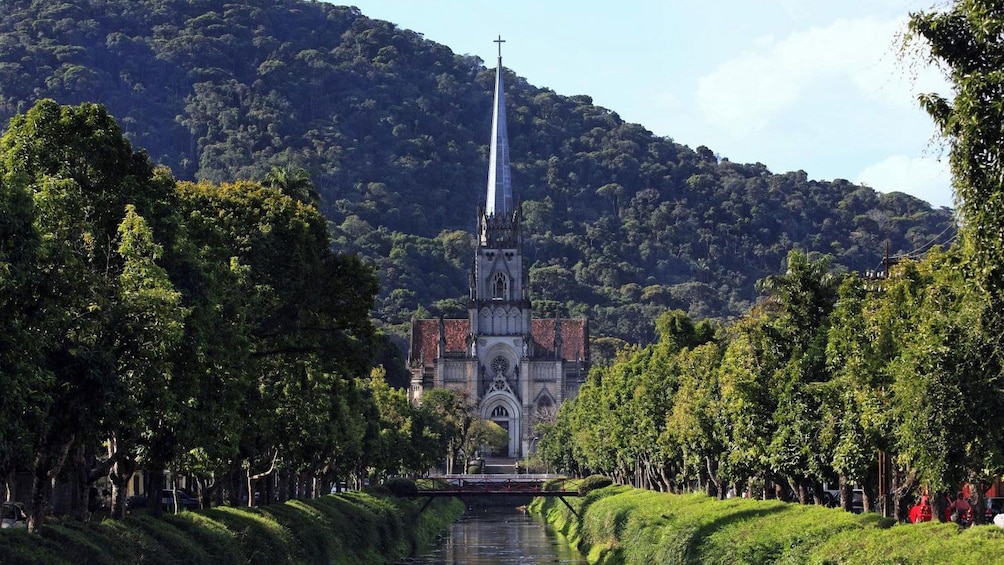 Tree-lined stream leading to the Cathedral of Petropolis in Rio de Janeiro
