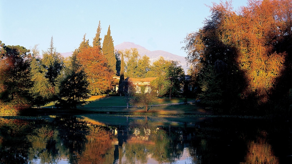 Concha Y Toro Winery with large pond and fall foliage in Santiago