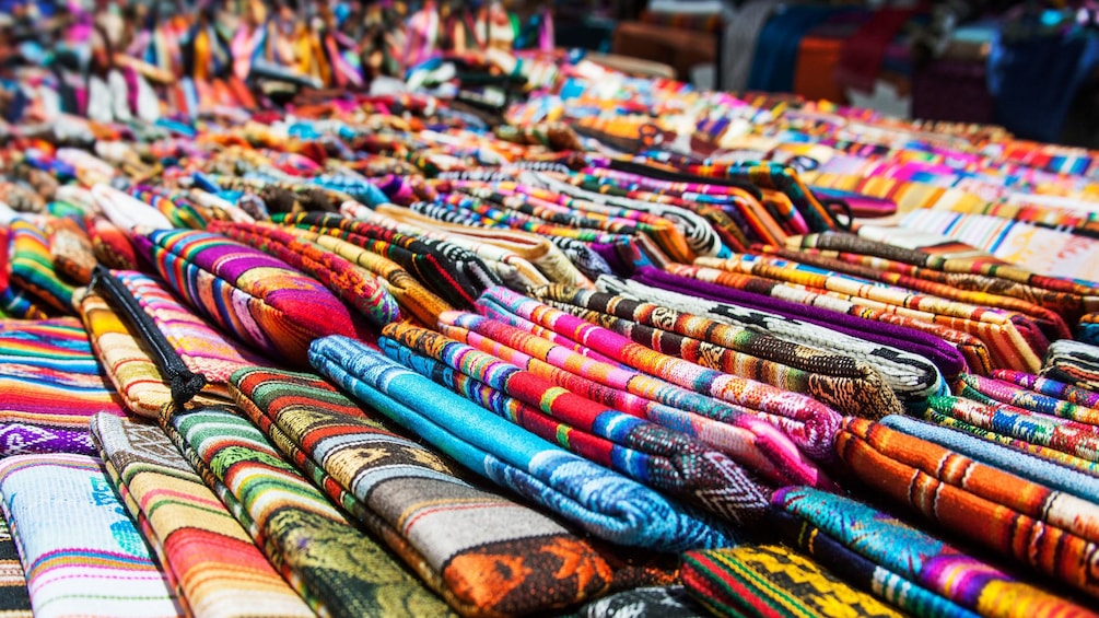 Colorful handmade goods for sale at the Otavalo Market