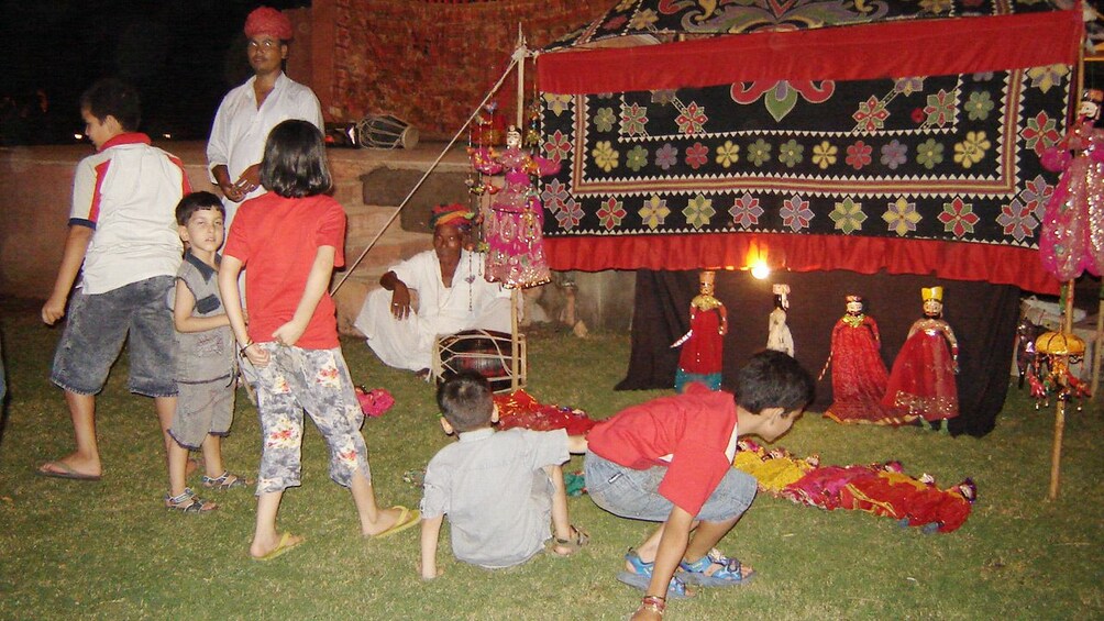 Children getting ready to view a Kathputli Puppet Show in Jaipur
