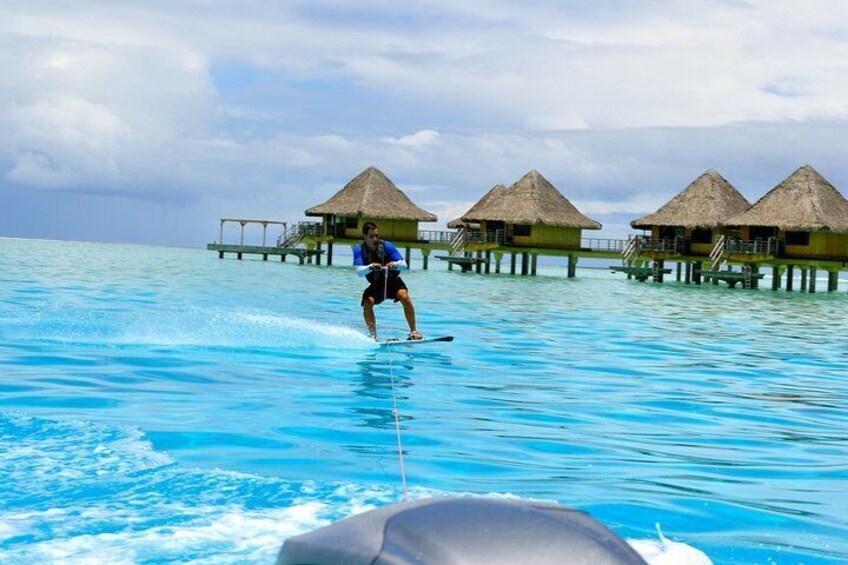 Wakeboarding on perfect blue water