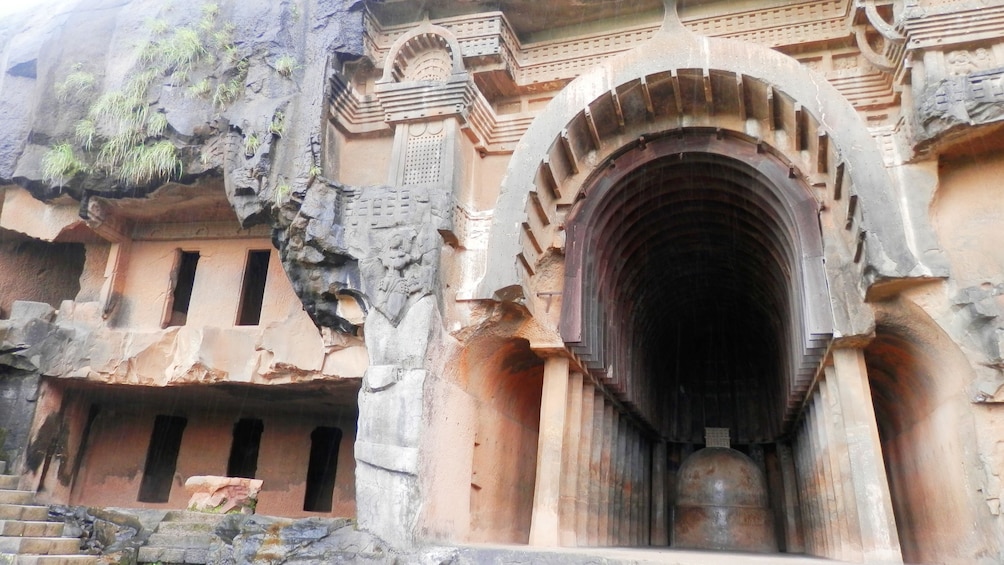 An ancient temple carved into a mountain in Karla