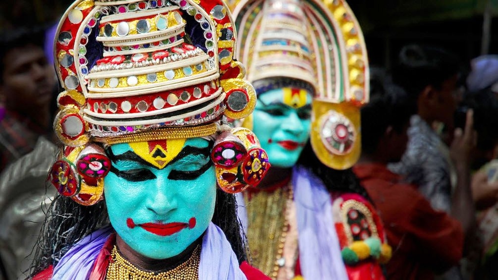 Two performers with their costumes on ready for their performance at the Kathakali Dance Show in Kochi 