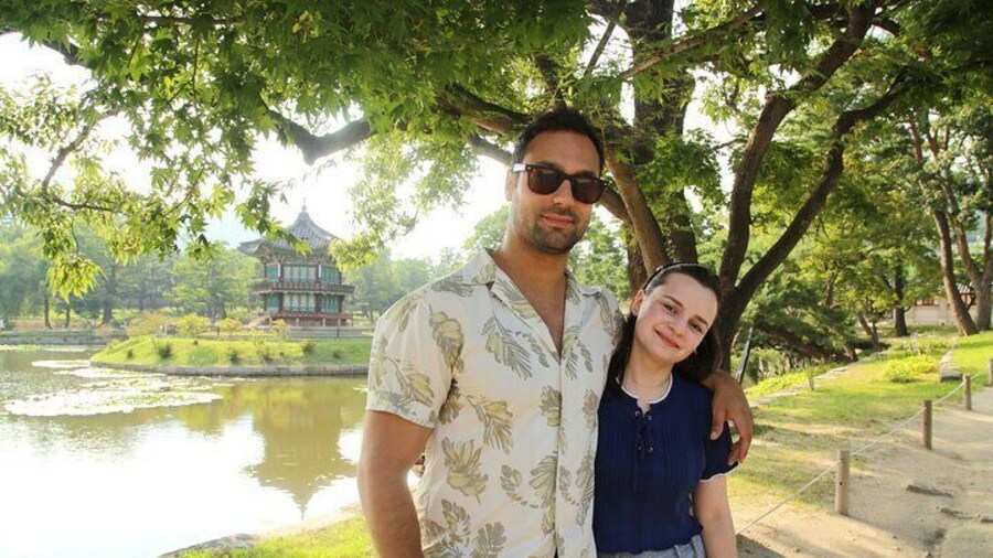 Couple at Gyeongbok Palace during a Seoul City tour