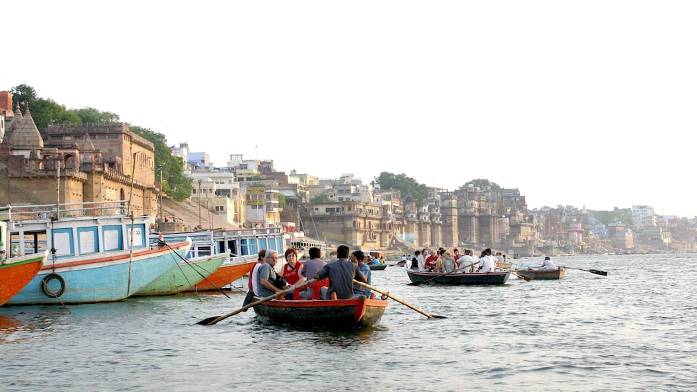 people in boats in india