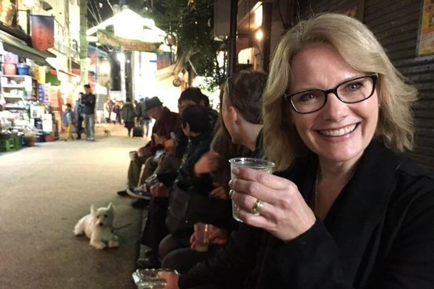 Enjoy sake at Yanaka Ginza.