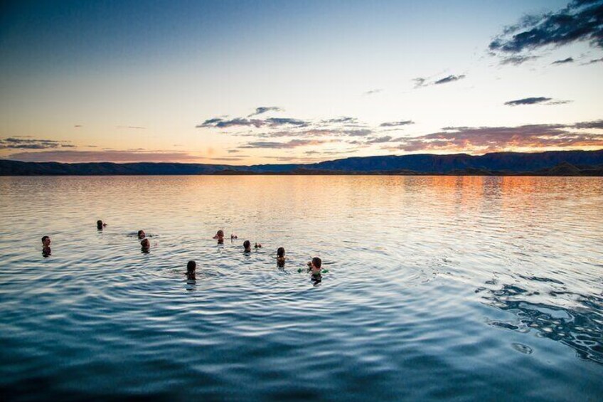 Swimming on sunset at Lake Argyle