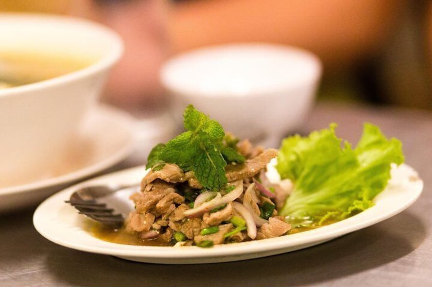 Traditional Thai food is served on a night tour, Bangkok, Thailand.