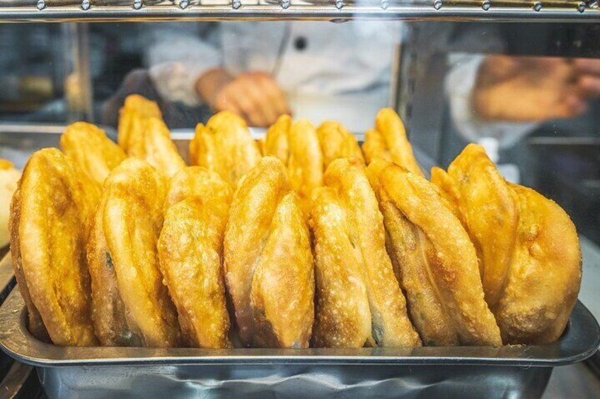 For 16 years, this pancake shop has been a local favorite. With just 5 ingredients, they create perfect fried dough with scallions, a labor of love by a family that starts at 3am.