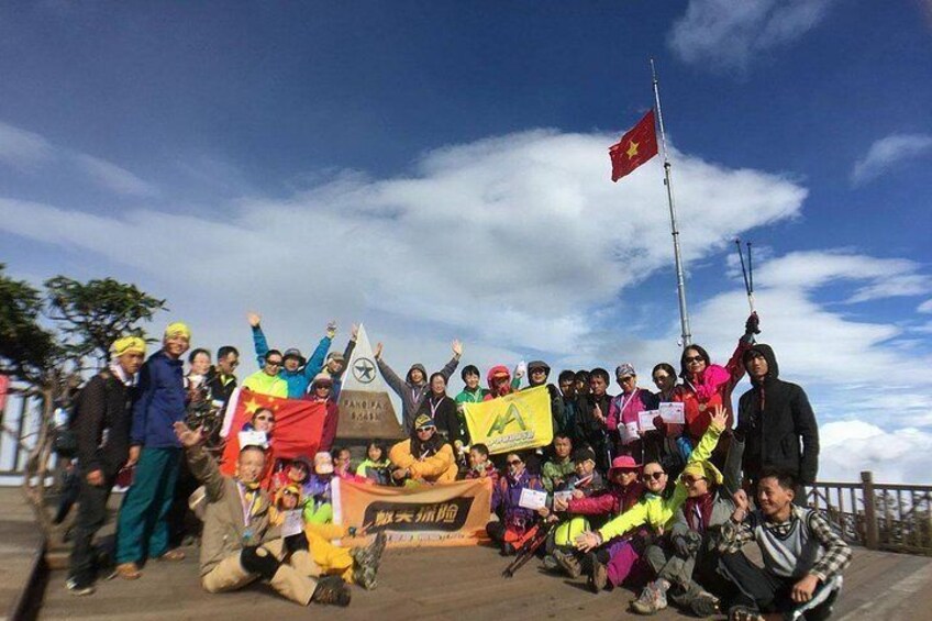 Happy group on Fansipan summit