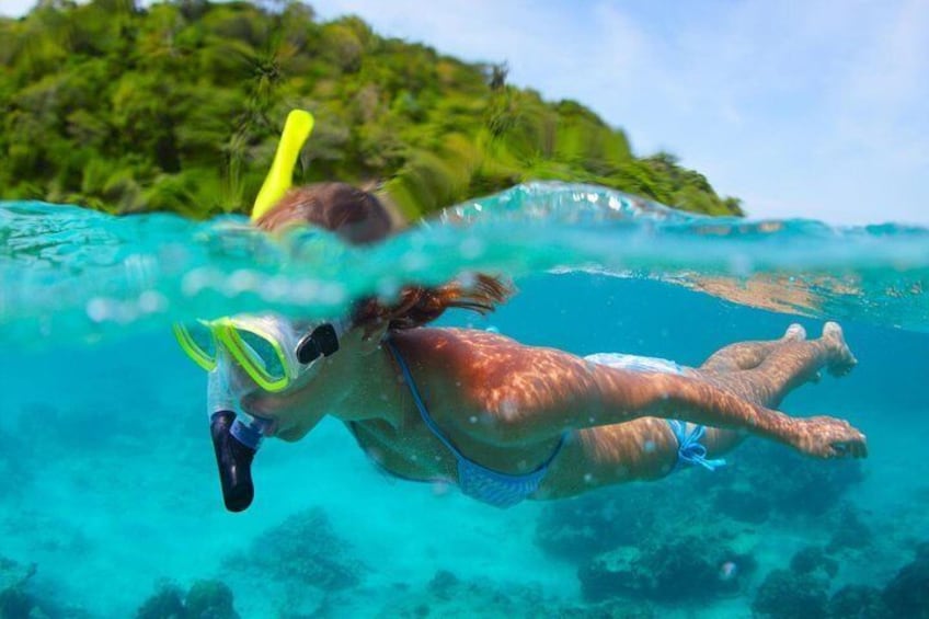 Snorkeling in crystal clear in Sapi Island