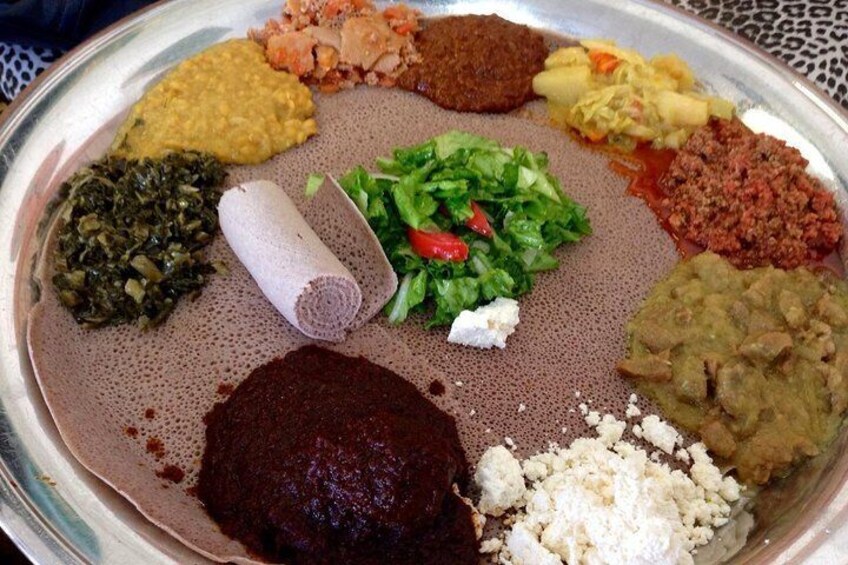 A traditional vegetarian Ethiopian dish known as Yetsom Beyaynet